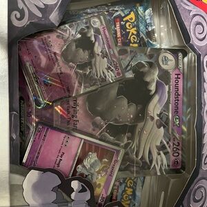 Pokémon Card Collection with Snorlax and Team Rocket Pack